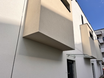 Fassade - Erstbezug! Neubau-Reihenhaus mit Terrasse, Dachterrasse, Loggien & Garten (auch für Anleger)