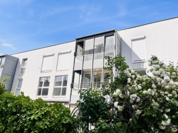 Hausansicht - Smarte Familienwohnung mit Potenzial in ruhiger Grünlage (nähe U1 Kagran, Vedmed Uni)