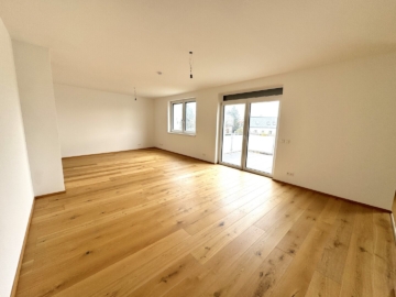 ERSTBEZUG! - Sehr helle 3-Zimmer-Wohnung mit großzügiger Dachterrasse in Autobahnnähe - Wohnbereich